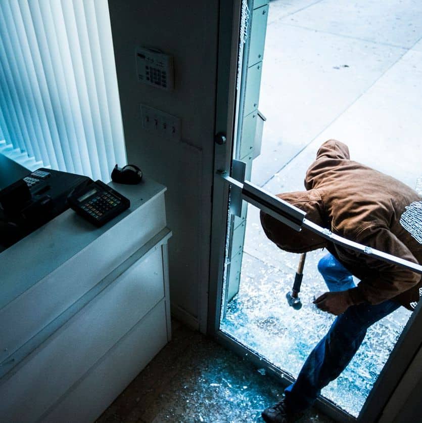 Robber using a sledgehammer