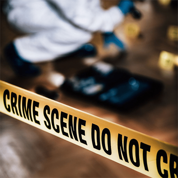 Forensic Science. Forensics Expert Collecting Clues from a Crime Scene